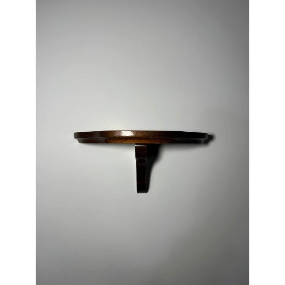 Small dark wood wall shelf